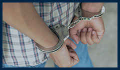 image of a man in handcuffs